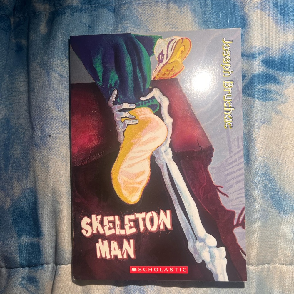 Scholastic Skeleton Man Book with Black and Yellow Cover